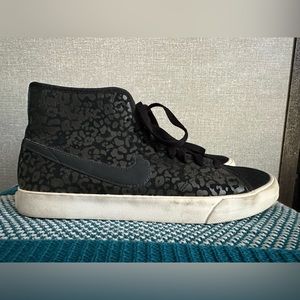 Nike black in black cheetah print high tops.